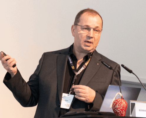 Götz Schartner, 8com